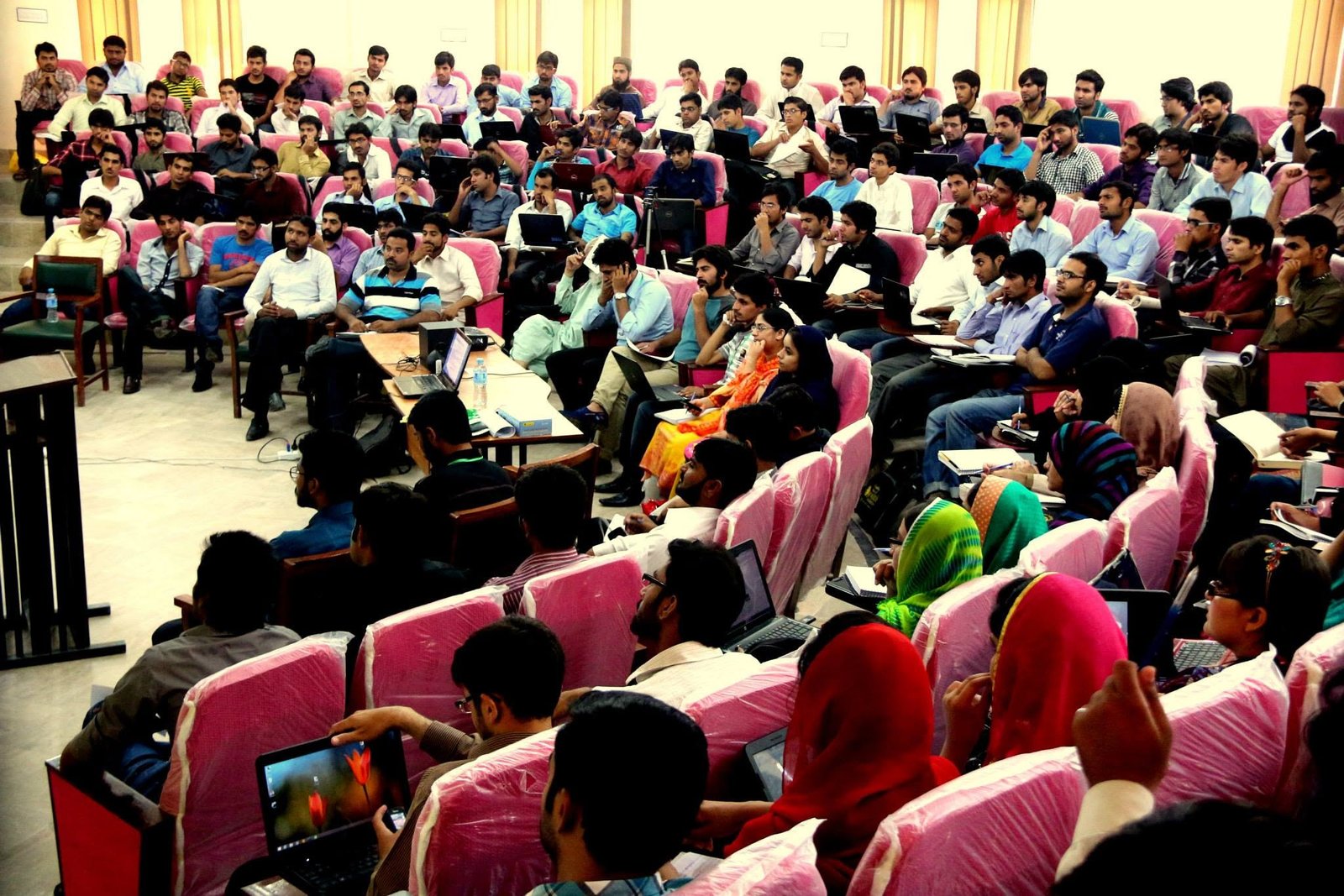 Ghulam Sarwar addressing a large student audience